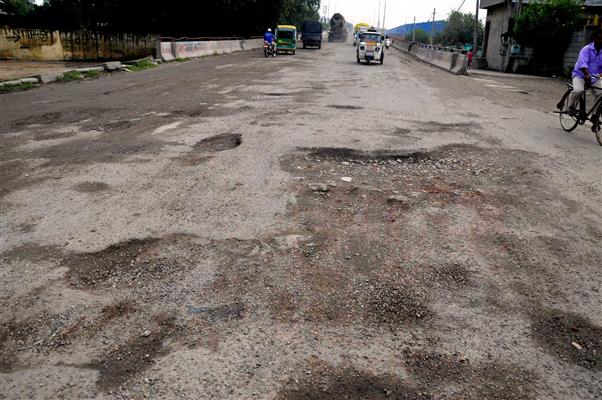 Potholed Dhandari flyover in Ludhiana poses threat