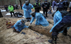 Ukraine finds new mass burials in Izium