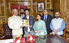Governor honours state NEET topper