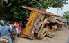 Girl hurt as truck overturns on three-wheeler in Faridabad