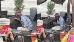Elderly man counting his daily earnings in his shack breaks hearts online