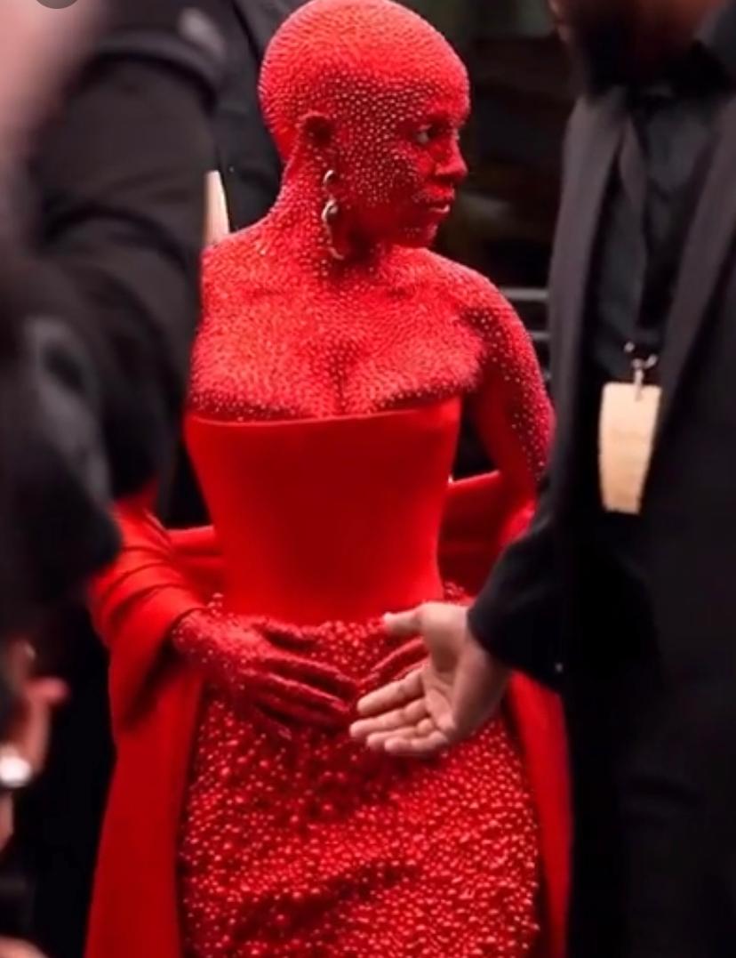 Singer Doja Cat covers herself in red paint, 30,000 crystals at Paris Fashion Week