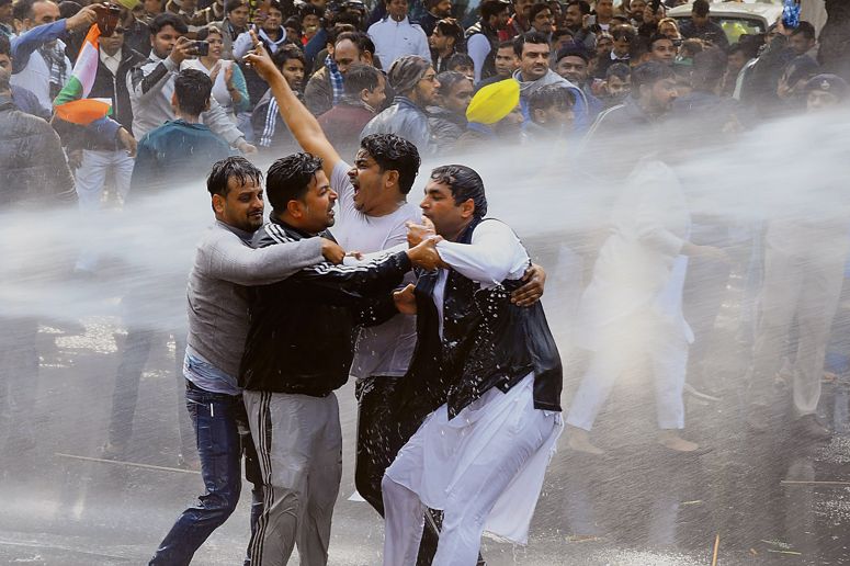 AAP protests outside BJP office in New Delhi over slum demolition order