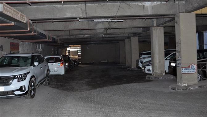 Parking lot unused, haphazard parking creates chaos