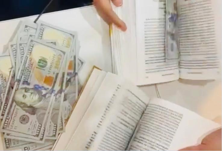 Video: Man hiding $90,000 between book pages held at Mumbai airport