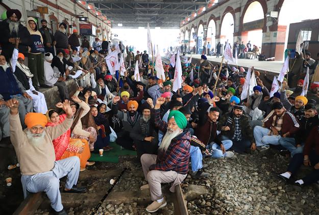 Demanding legal guarantee on MSP and withdrawal of cases, farmers block railway tracks in Punjab; trains stranded