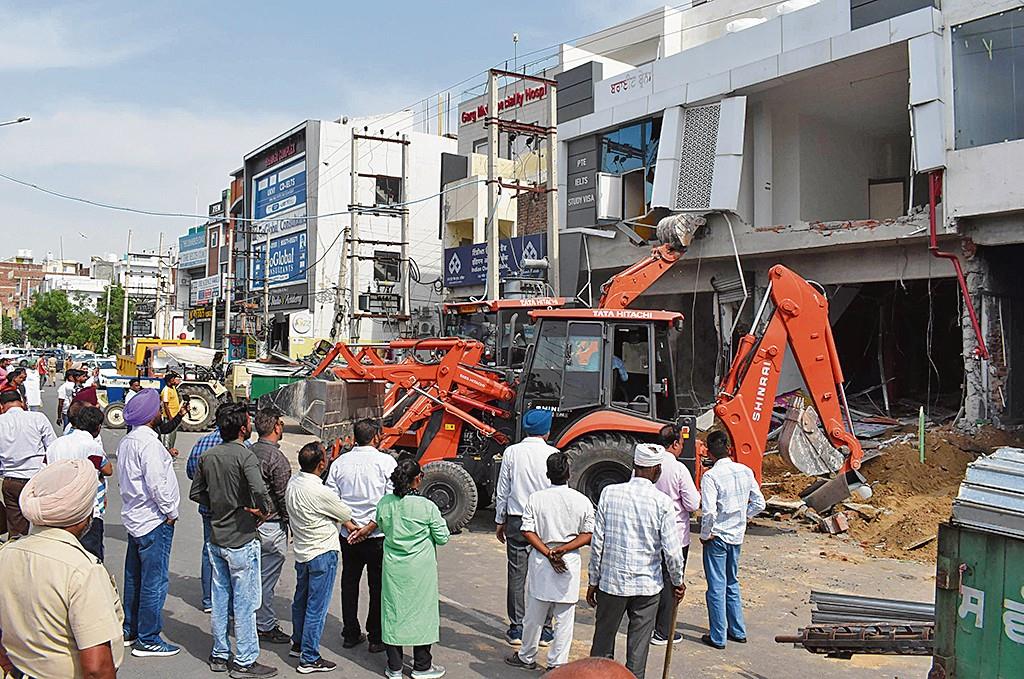 3 shops built illegally on Pearls Group land demolished in Bathinda, 3 nabbed