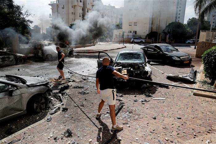 Israel battles Hamas militants as country's death toll from mass incursion reaches 600