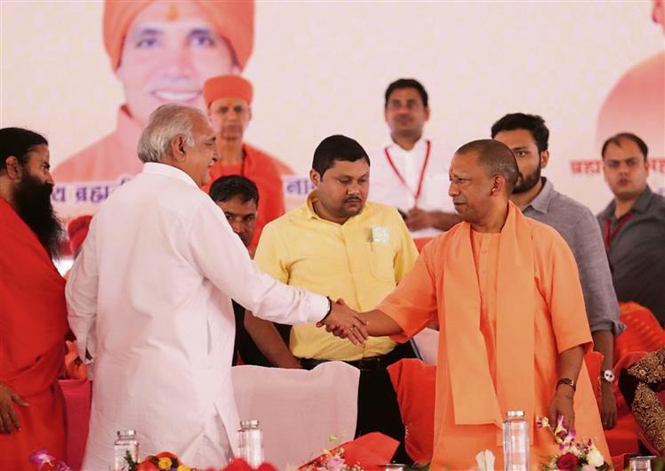 Bhupinder Hooda shares stage with RSS chief Mohan Bhagwat, Yogi Adityanath, BJP leaders in Rohtak