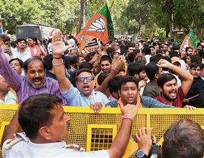 BJP demands Kejriwal’s ouster over liquor scam; AAP hits back