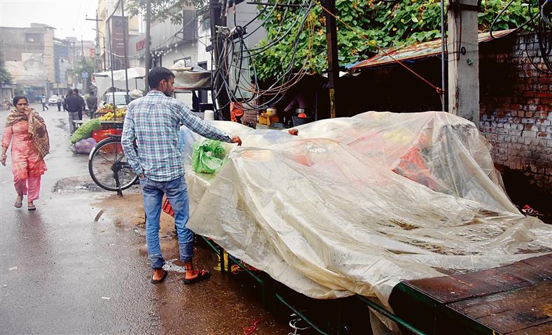 Rain disappoints roadside vendors selling festive wares