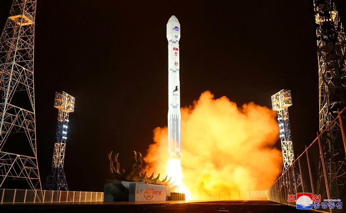 South Korea partially suspends inter-Korean agreement after the North says it launched spy satellite