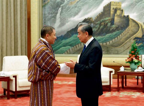 China charms Bhutan with an eye on India