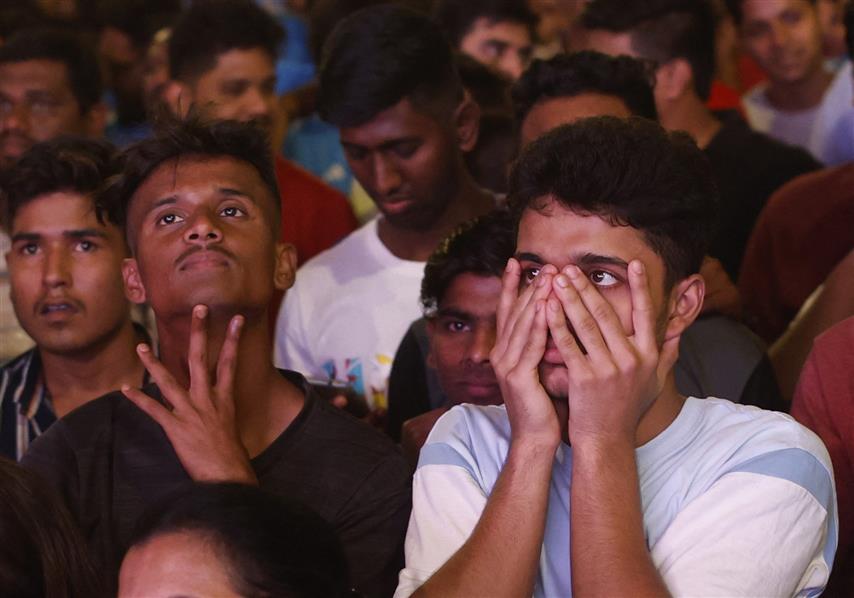 In pictures: Australia break billion hearts, India falter at final hurdle
