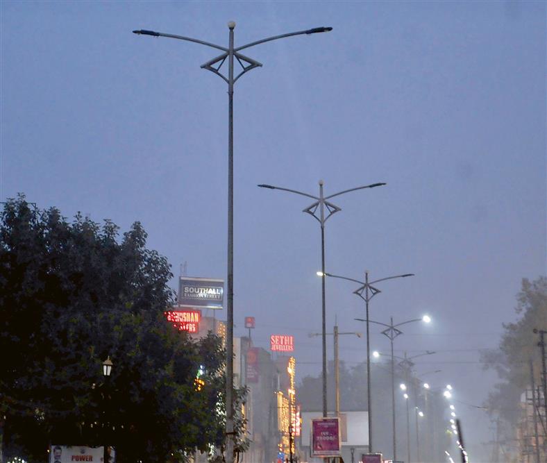 Defunct streetlights add to commuters’ misery as dense fog engulfs holy city