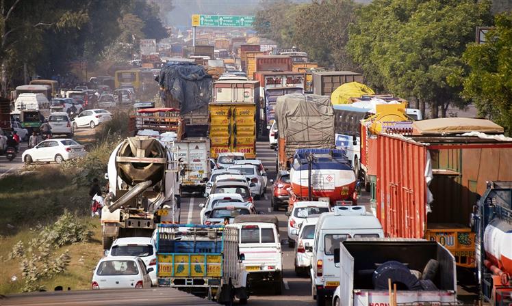 Commuters stranded for hours on national highway as contractual staff block Ladhowal toll