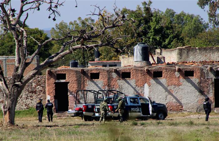 Group turned away at Mexican holiday party returned with gunmen killing 11, say investigators