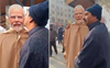 Kashmiri man expresses his fervent adoration for PM Modi, drapes leader’s cut-out in pheran
