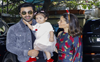 Bollywood’s power couple Alia Bhatt and Ranbir Kapoor pose with their baby daughter Raha for the very first time