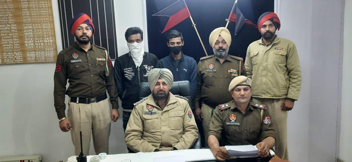 2 held with 250 boxes of smuggled liquor