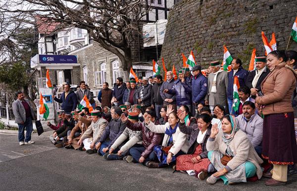Congress stages dharna outside SBI offices in Himachal Pradesh, demands probe into Adani group