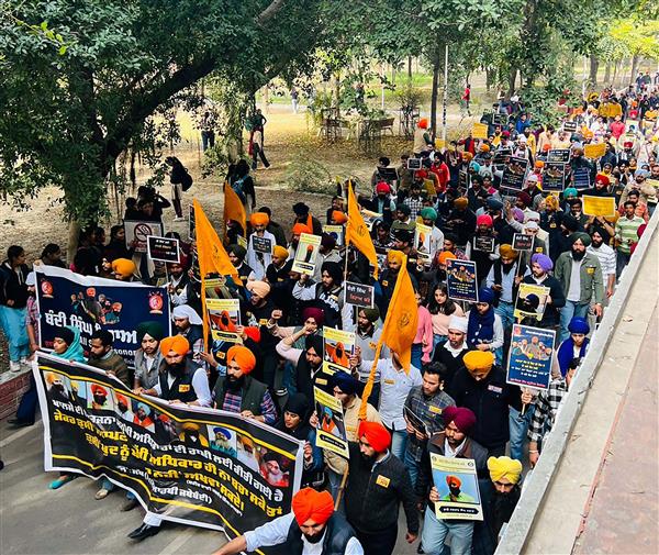 GNDU students take out march for 'Bandi Singhs'