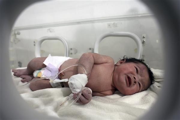 Miracle baby: Newborn with umbilical cord still connected to her mother saved from rubble in quake-hit Syrian town