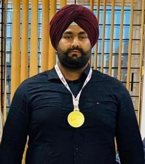 Dilbar wins gold in weightlifting