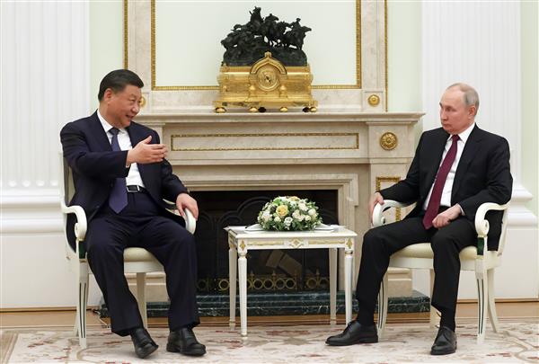 Vladimir Putin meets 'dear friend' Xi Jinping in Kremlin as Ukraine war grinds on