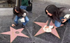 Is that Courteney Cox or Monica Geller of FRIENDS cleaning Hollywood Walk of Fame star in this video