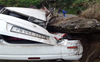 Car damaged in landslide at Rampur