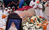 Queues of mourners, PM leads tributes