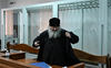 Ukraine asks court to put Orthodox leader under house arrest