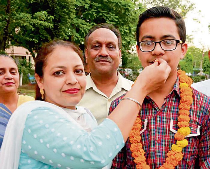 Class XII result: Bus driver’s son science topper