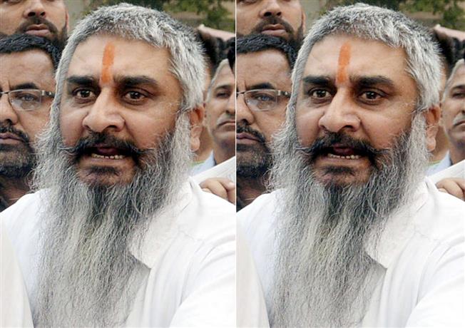 Slain Hindu religious leader Sudhir Suri’s brother Brij booked for firing in air