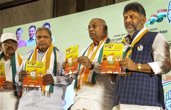 Congress releases Karnataka poll manifesto; promises to repeal all  'anti-people laws' passed by BJP govt : The Tribune India