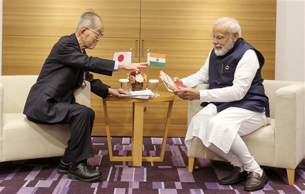 In Japan, PM Modi meets linguist in Punjabi