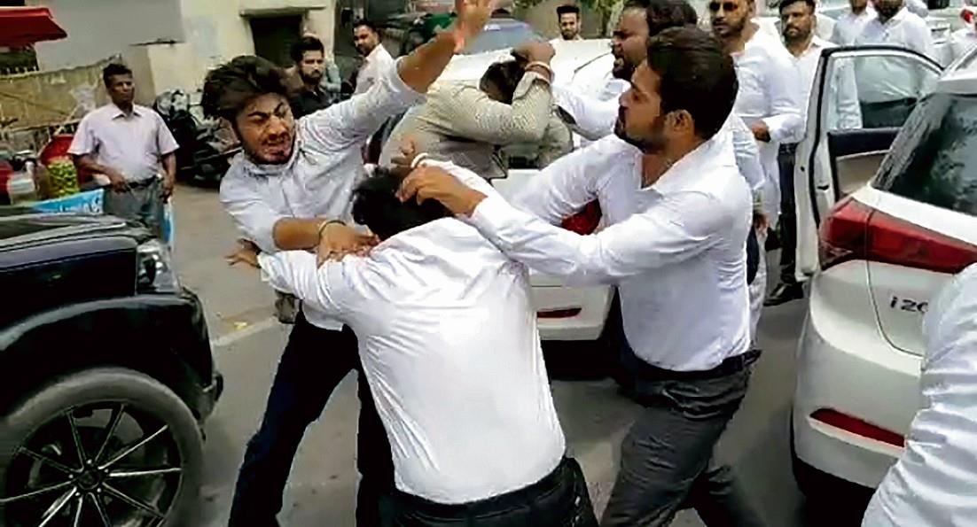 Protesting lawyers, three youths clash