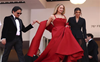 Jennifer Lawrence pairs comfy flip flops with Dior gown at Cannes red carpet