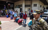 Newborn babies, bed-ridden patients wait in cramped Imphal airport to escape violence