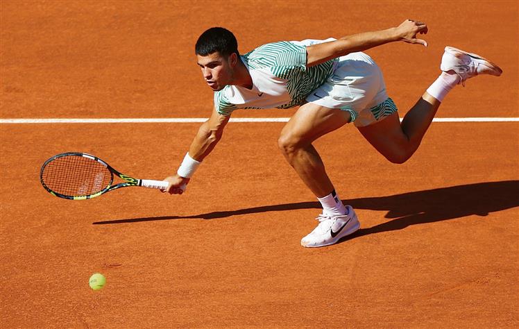 French Open: Top seed Carlos Alcaraz stumbles before recovering