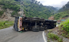 Truck overturns at Nahan, diversion of liquor detected