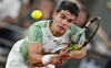 French Open: Top seed Alcaraz hunts down Tsitsipas to set up Djokovic showdown