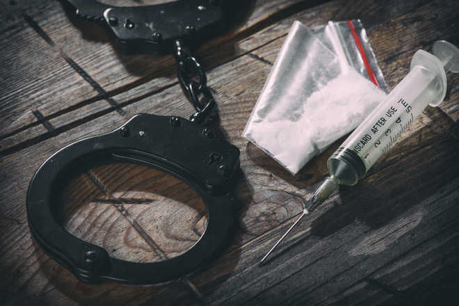 Man arrested with heroin