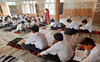 School waterlogged, classes held at dharamshala in Jhajjar