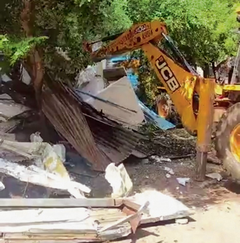 100 illegal structures razed on zila parishad land in Gurugram