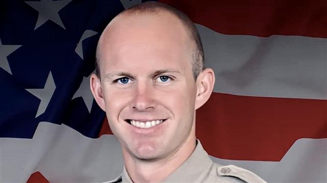 Los Angeles County sheriff's deputy dies after being shot in his patrol car by assailant