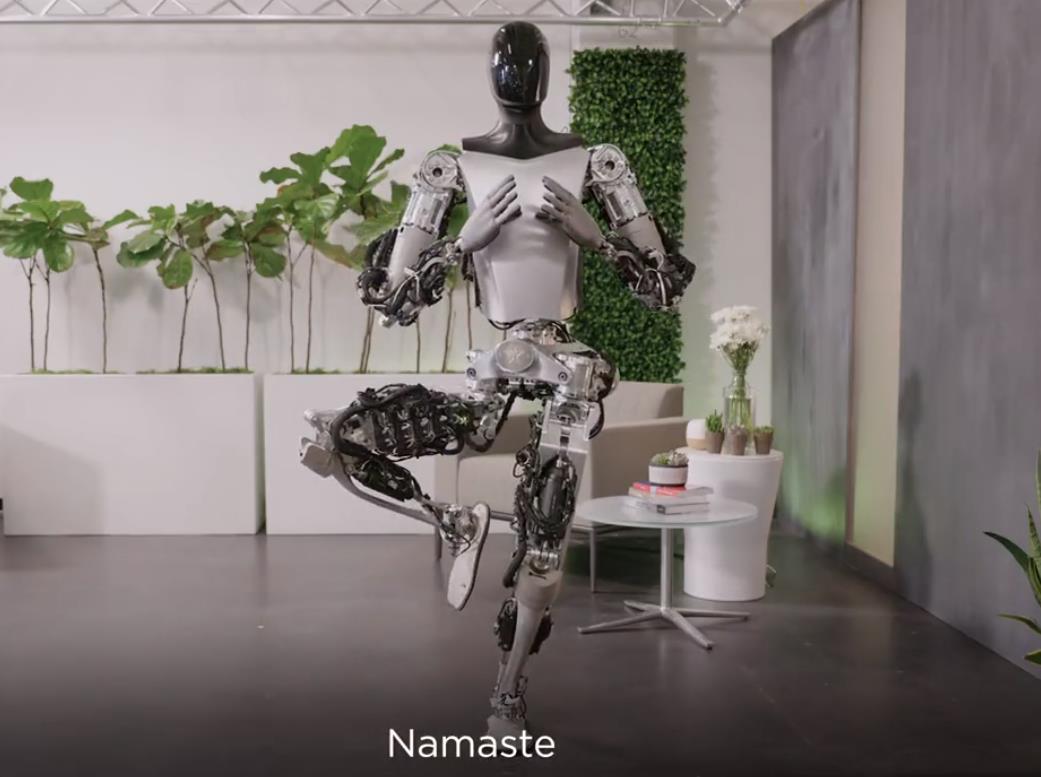 Elon Musk showcases Tesla’s humanoid robot performing Yoga, sorting objects