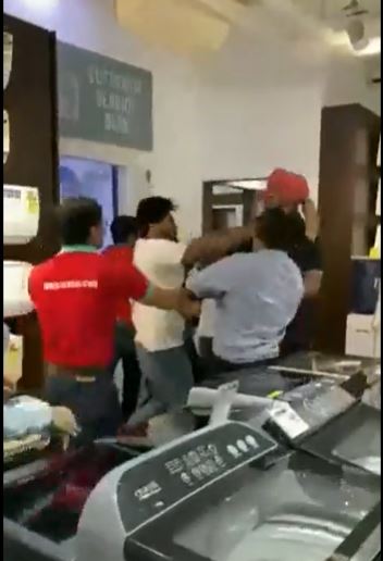 Watch: Upset over delay in their iPhone 15 delivery, 2 customers beat up electronics store employees in Delhi