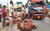 Truck loaded with LPG cylinders hits another
